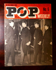 THE BEATLES ON THE FRONT COVER