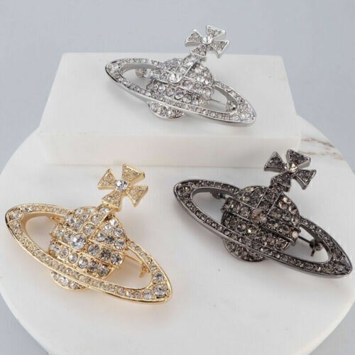 New bas orb relief brooch - bas,