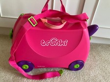 Kids pink purple ride on Trunki airport hand luggage travel case parent handle