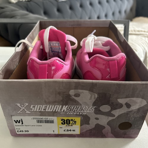 Pink sidewalk sports heelys - sidewalk, by