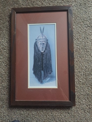 African tribal masks framed