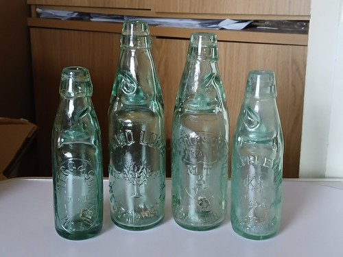 Old glass codd bottles - glass,