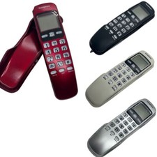Wall mounted corded telephone - mounted,