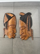 AFRICAN MAN & WOMAN HANGING