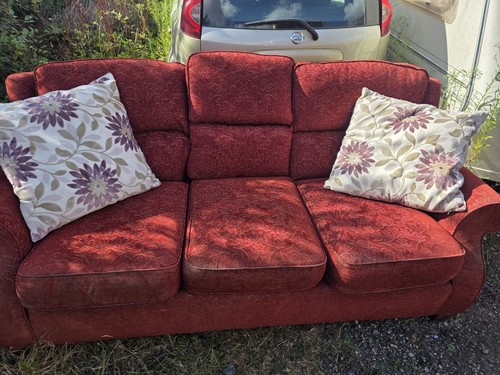 Maroon seater sofa good - in,