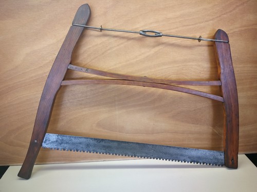 Large vintage buck - bow, saw