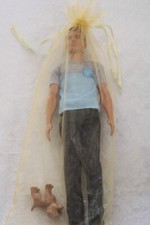 Boy Barbie doll, complete with