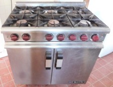 An Industrial 6 ring Lpg  gas cooker complete with gas bottles & fittings
