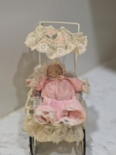 Vintage porcelain baby doll in