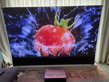 Stunning  Motorised Vividstorm ALR Screen and Chiq UST Projector bundle.