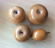 four contemporary carved treen wooden fruit