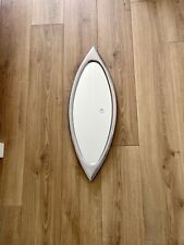 Barker and Stonehouse polished aluminium teardrop shaped framed mirror