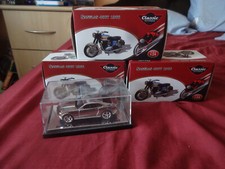 Joblot of diecast Sanglas 400T bikes (scale 1:24) plus Chevy Camaro concept 2006