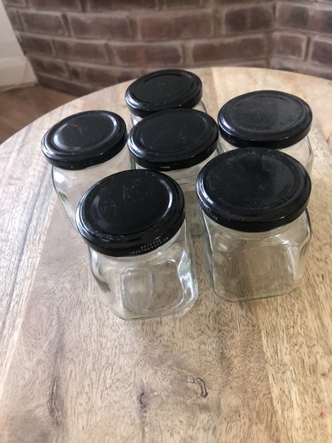 Six empty jars - with, lids