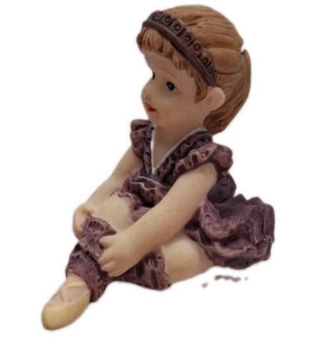 Sitting ballerina girl - sitting,