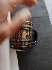 Greek ceramic mug featuring