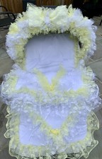 White and Yellow Lace Pram