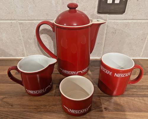 Nescafe red coffee pot milk - coffee,