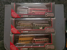 boxed corgi buses