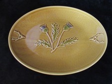 West Highland Pottery Co Ltd Oval Plate with Raised Ochre Thistle Pattern 30 cm