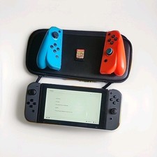 A Nintendo Switch With Fake Joycons And A Case With The Minecraft Game