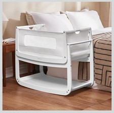 White Bedside Crib, Rocking Stand, Mattress, Mattress Protector Plus Accessories