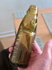 PICTORIAL 6OZ DARK GOLDEN AMBER CODD BOTTLE FROM SALFORD GOOD CONDITION. 