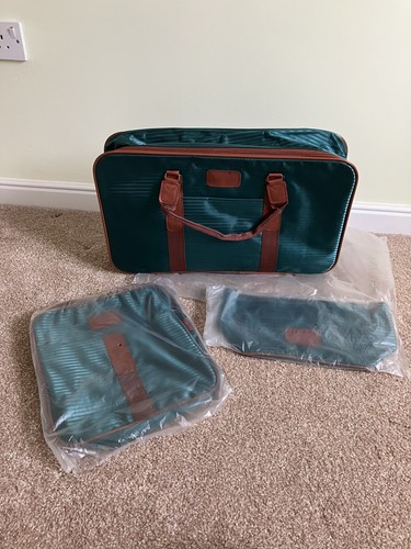 Unused vintage green luggage - vintage,