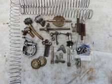 S.U. BITS A BUNDLE OF AN ASSORTMENT OF CARB BITS  & PIECES  ,SEE PICTURES    .