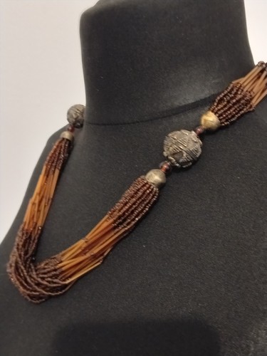Statement earthy coloured - , seed