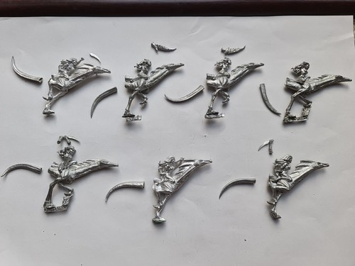 Metal mounted daemonettes of - mounted,