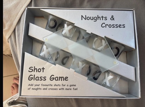 Noughts crosses shot - noughts, glass