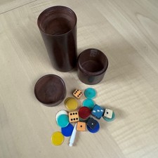Vintage wooden screw top dice shaker and storage tube.
