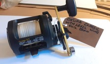 OKUMA CLASSIC XT CLX-300L LEVEL WIND  BOAT REEL LOADED WITH 50LB BRAID
