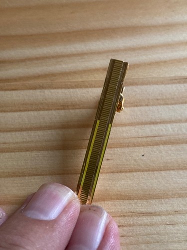 Vintage gold toned tie - a, clip