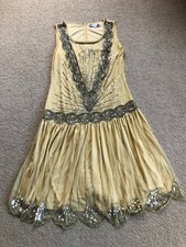 Heavily beaded cream - heavily,