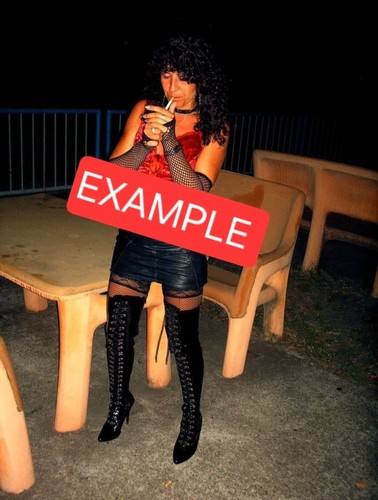 Mature female smoking - female,