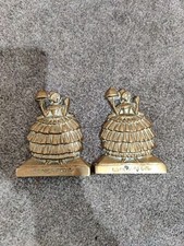 A Pair Of Bronze Plaques Of