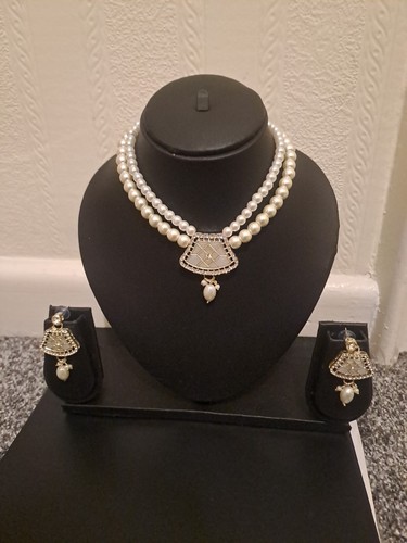 Pearl choker necklace and - pearl,