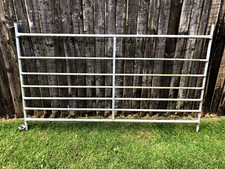 Galvanised metal field gate