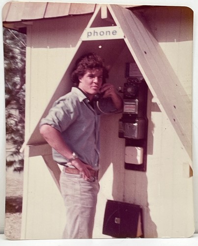 1970s handsome man payphone - man,