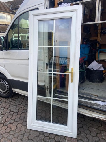 Used white upvc - door, and