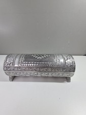 Indian embossed silver tone