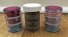 Gold Metal Magic Powder And Glitter And Embossing Powder In Blue Pink And Purple