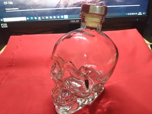 Bottle glass skull - , (empty)