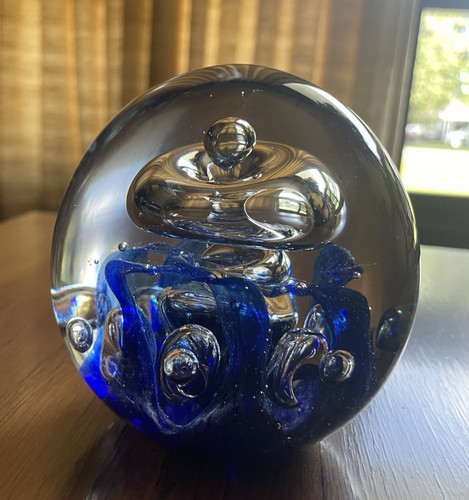 Gently used glass paperweight - used,