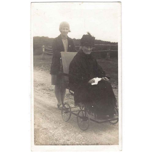 Social history woman pushing - history,