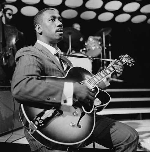 Wes montgomery performs with - montgomery,