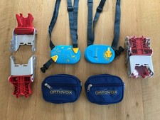 2 Ortovox F1 Transceivers and 2 pairs unused Fritschi Axion-82 crampons