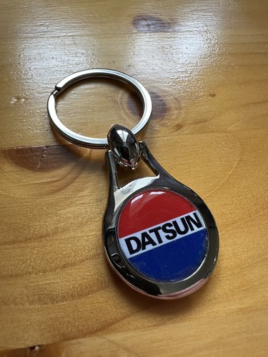 Datsun chrome key ring domed - ring.,